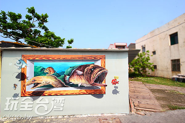 小丑鱼就像浮出墙面一般的逗趣/玩全台湾旅游网摄